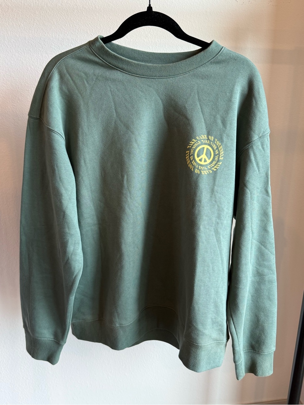 H&M Olive Green Crewneck Sweatshirt with Yellow Peace Graphic